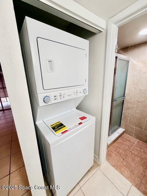 1609 Sunny Brook Lane, Unit E201 Palm Bay, FL 32905 - Photo 13 of 15 a utility room with dryer and washer