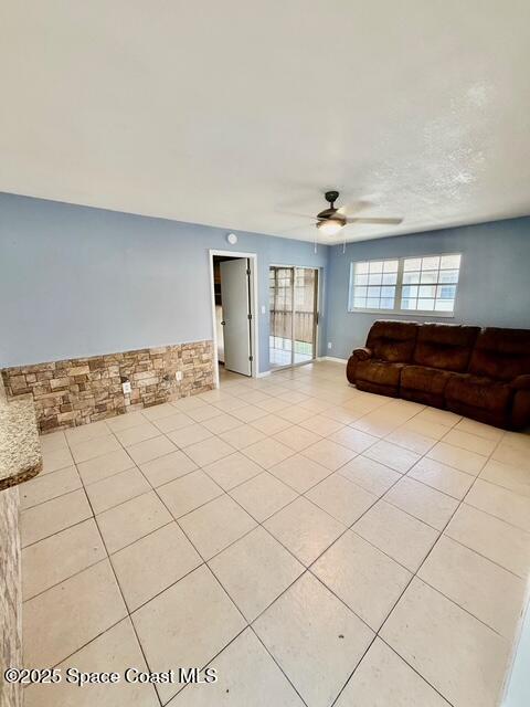 1609 Sunny Brook Lane, Unit E201 Palm Bay, FL 32905 - Photo 5 of 15 a bedroom with a bed and a window