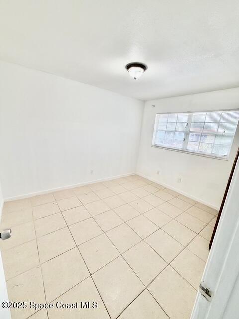 1609 Sunny Brook Lane, Unit E201 Palm Bay, FL 32905 - Photo 7 of 15 a view of a room with white walls