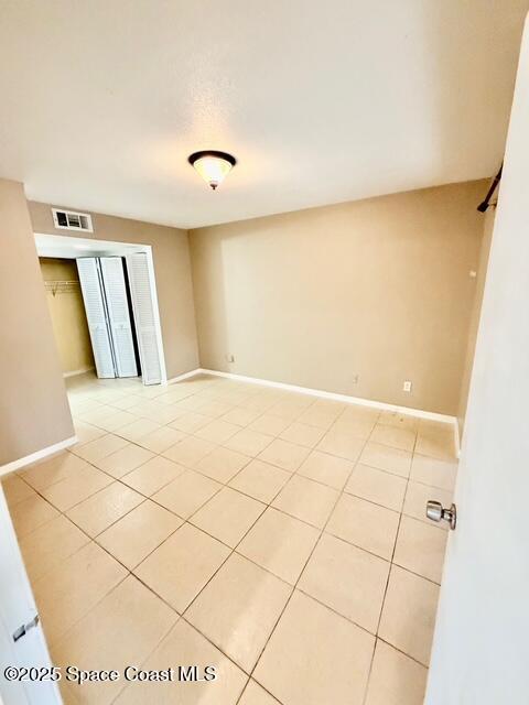 1609 Sunny Brook Lane, Unit E201 Palm Bay, FL 32905 - Photo 9 of 15 a view of a room with wooden floor