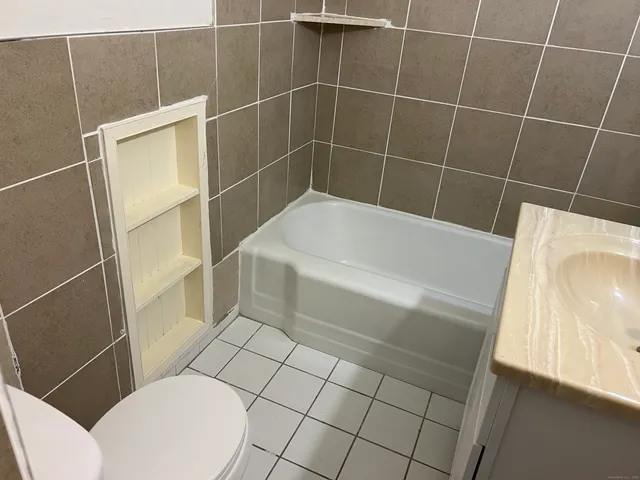 a bathroom with a sink and a bathtub