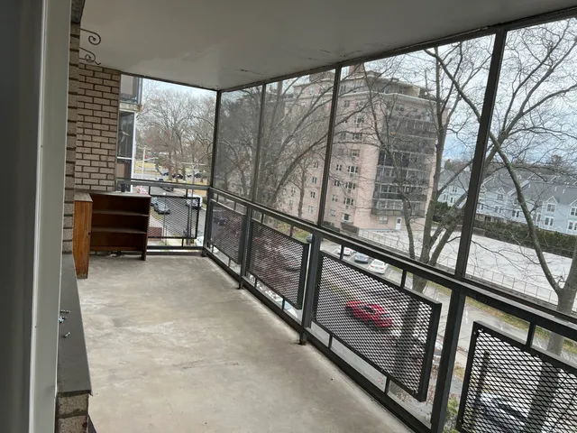 a kitchen with a refrigerator and a stove