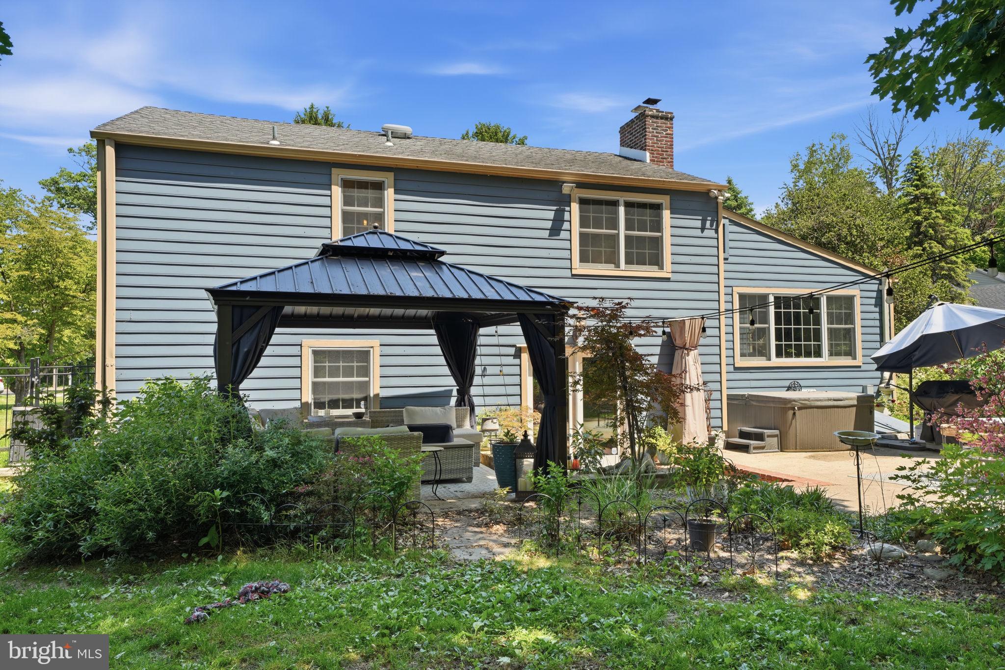 621 River Road Yardley, PA 19067 - Photo 60 of 75 a front view of a house with garden