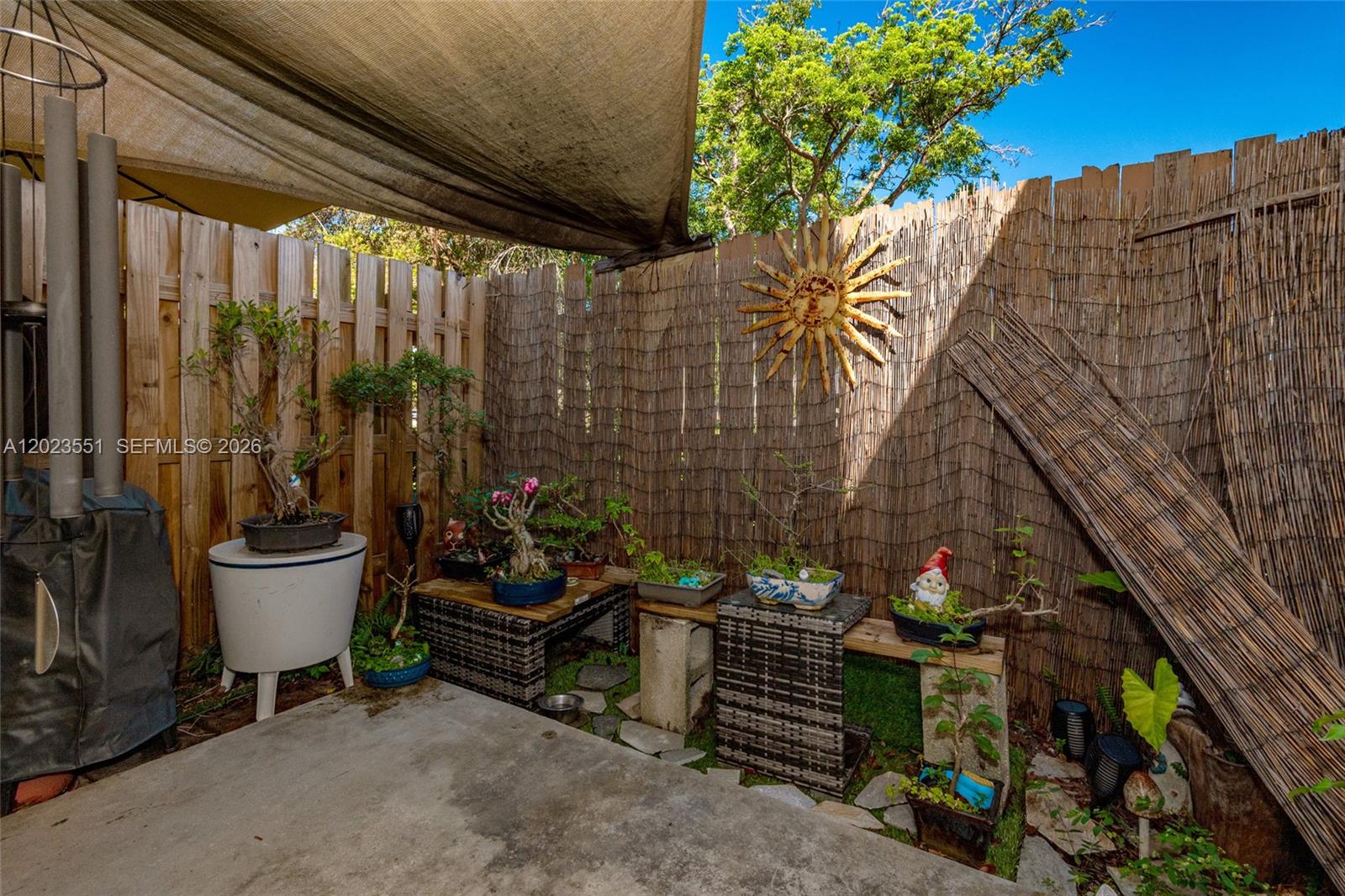 11482 Southwest 109th Road, Unit 29A Miami, FL 33176 - Photo 28 of 28 a view of a chairs and table in a patio