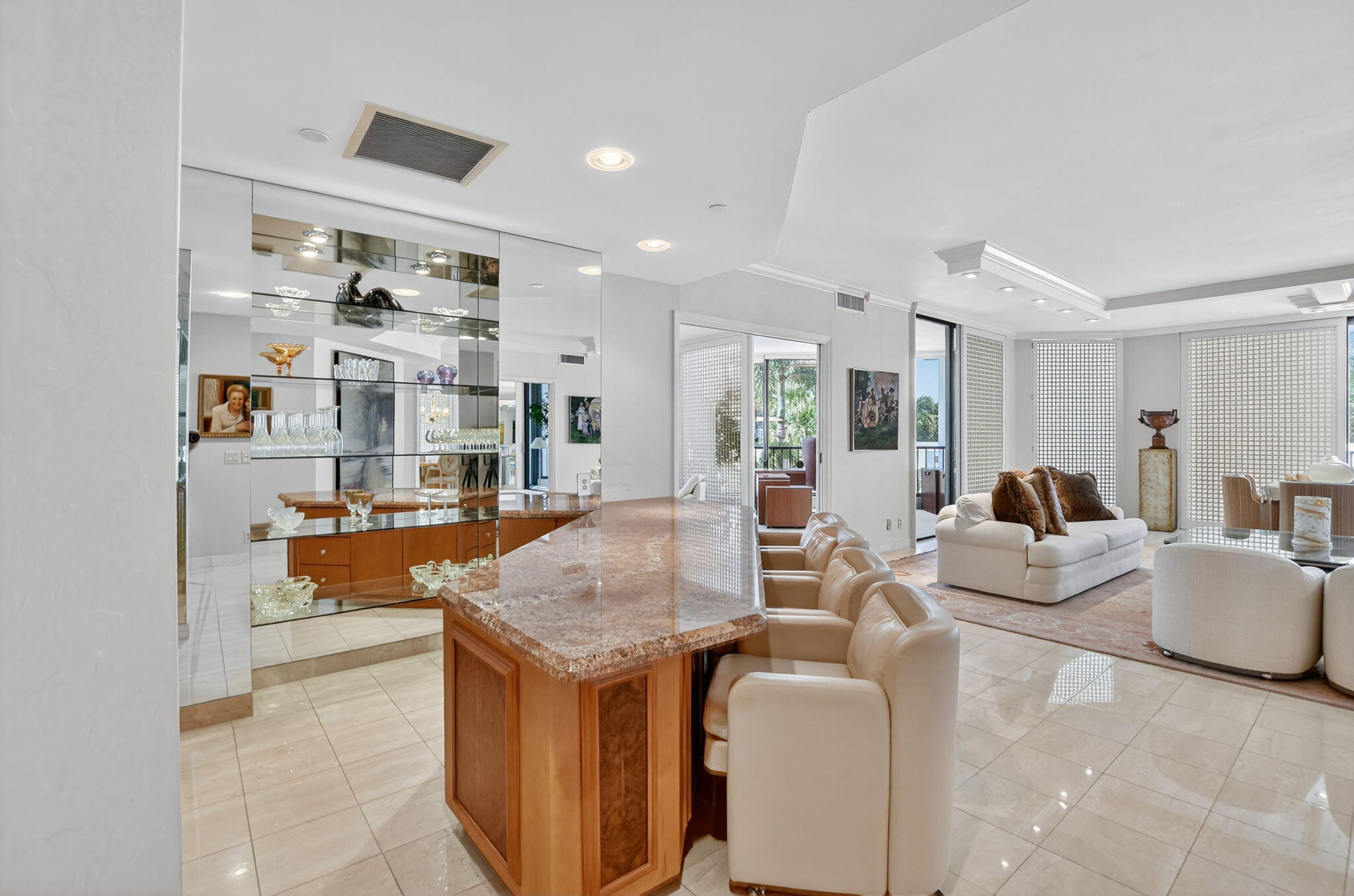 20310 Fairway Oaks Drive, Unit 124 Boca Raton, FL 33434 - Photo 11 of 65 a living room with furniture and a table