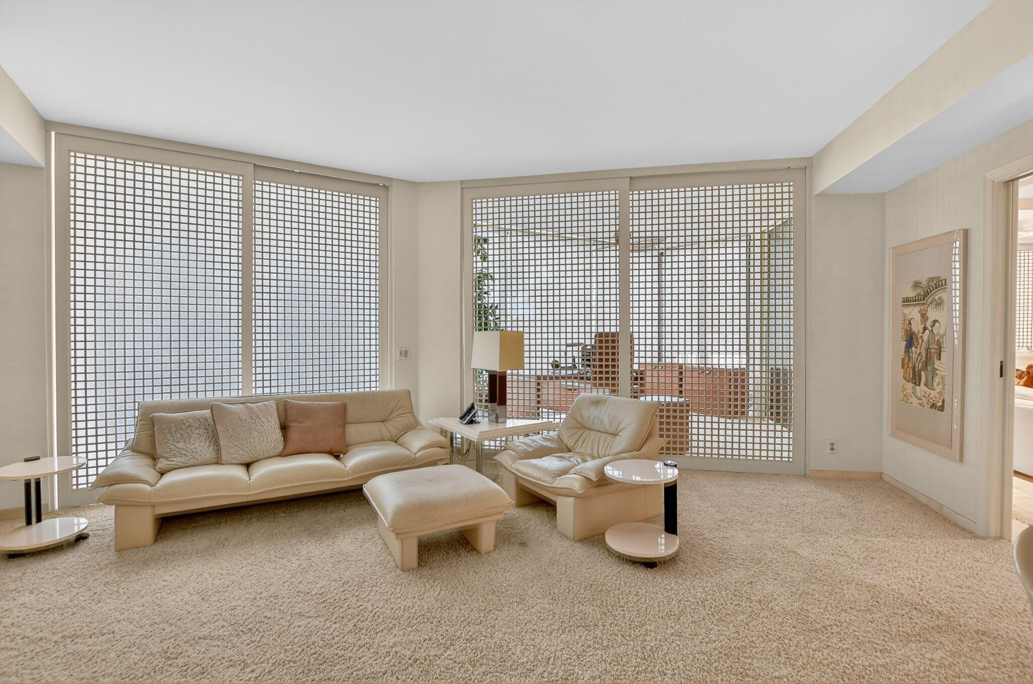20310 Fairway Oaks Drive, Unit 124 Boca Raton, FL 33434 - Photo 16 of 65 a living room with furniture and a large window
