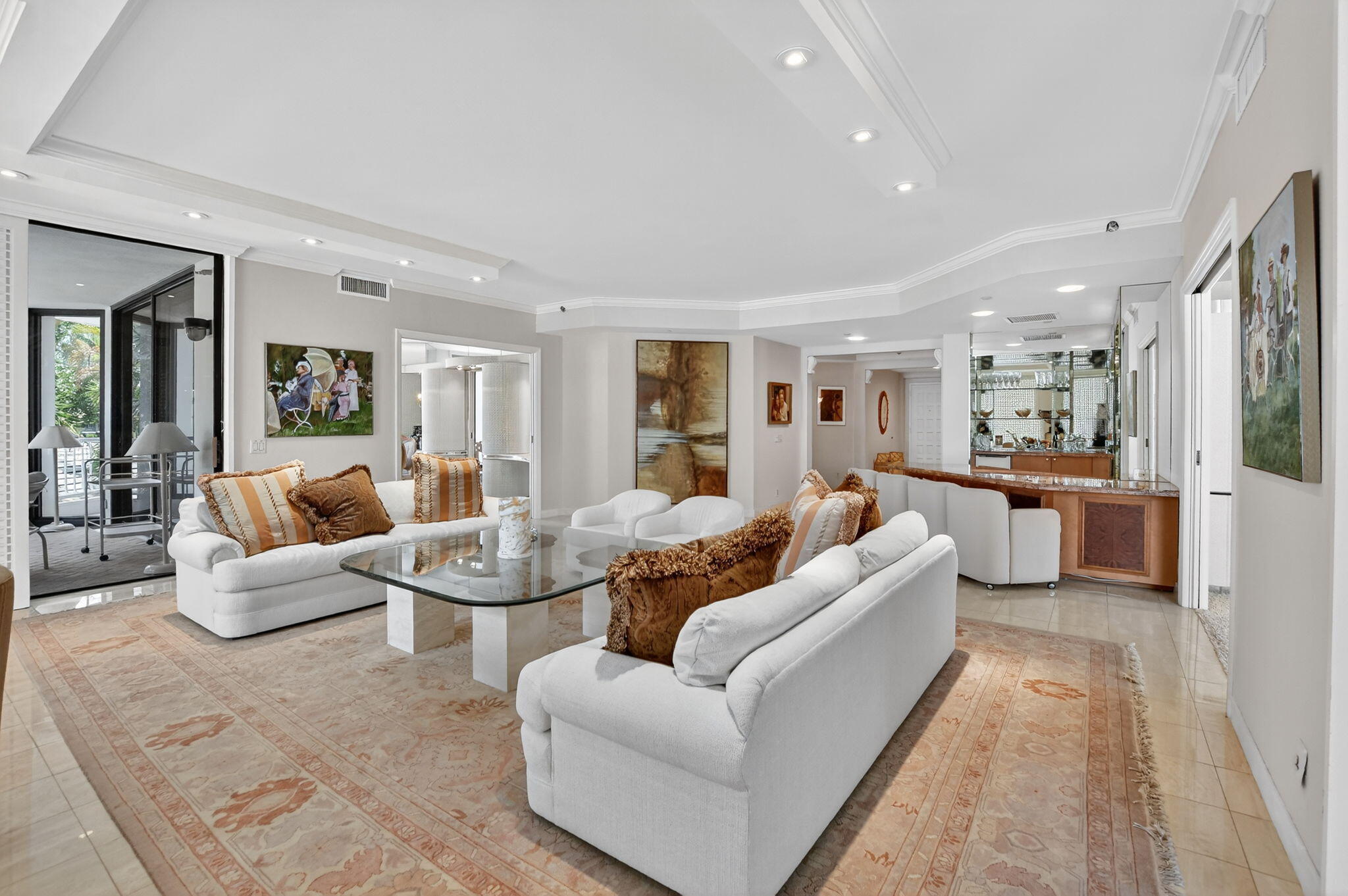 20310 Fairway Oaks Drive, Unit 124 Boca Raton, FL 33434 - Photo 2 of 65 a living room with furniture and a view of kitchen