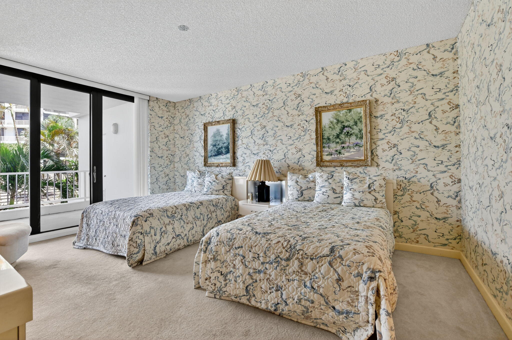 20310 Fairway Oaks Drive, Unit 124 Boca Raton, FL 33434 - Photo 25 of 65 a bedroom with two beds and a large window