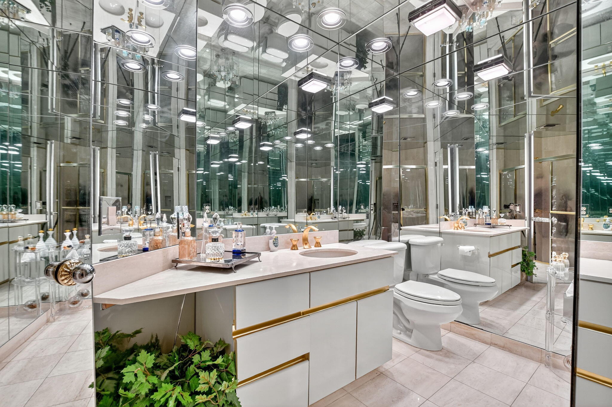 20310 Fairway Oaks Drive, Unit 124 Boca Raton, FL 33434 - Photo 27 of 65 a room with lot of white cabinets and couches