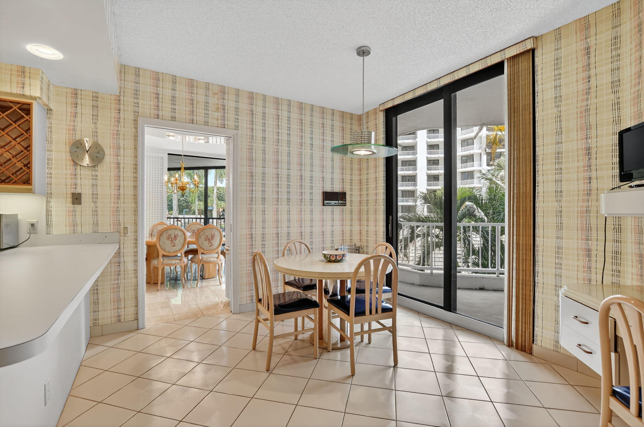 20310 Fairway Oaks Drive, Unit 124 Boca Raton, FL 33434 - Photo 36 of 65 a view of a dining room with furniture window and outside view