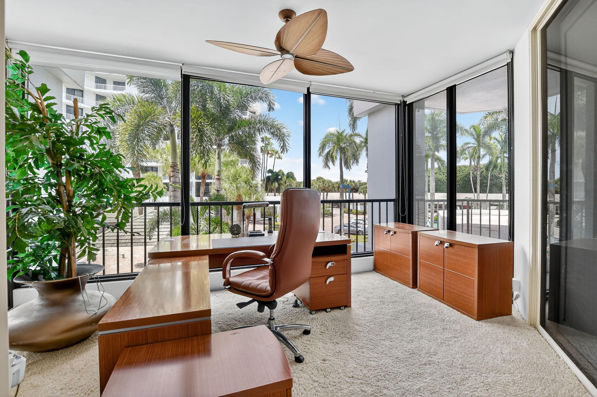 20310 Fairway Oaks Drive, Unit 124 Boca Raton, FL 33434 - Photo 4 of 65 a living room with furniture and a potted plant