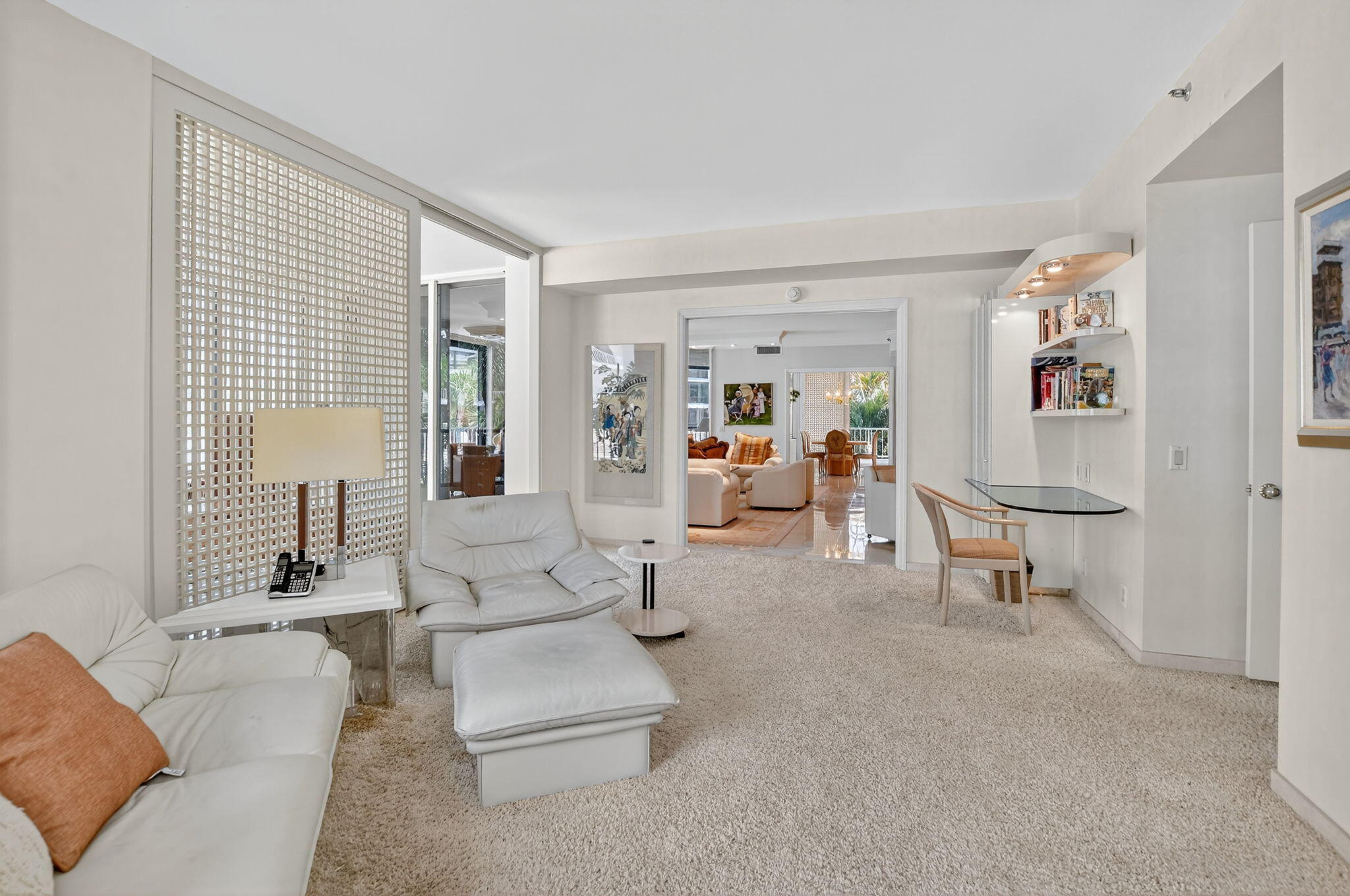 20310 Fairway Oaks Drive, Unit 124 Boca Raton, FL 33434 - Photo 44 of 65 a living room with furniture and a table