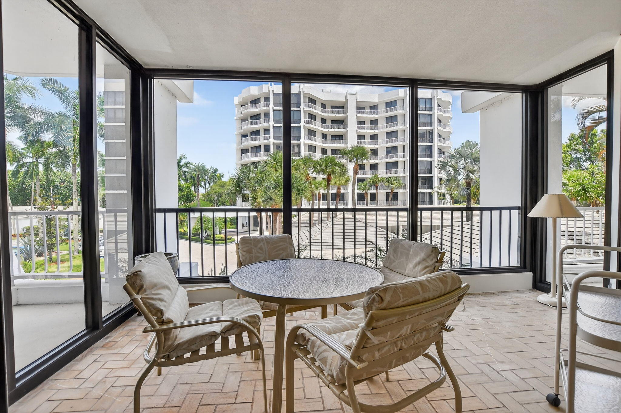 20310 Fairway Oaks Drive, Unit 124 Boca Raton, FL 33434 - Photo 5 of 65 a dining room with furniture window and outside view
