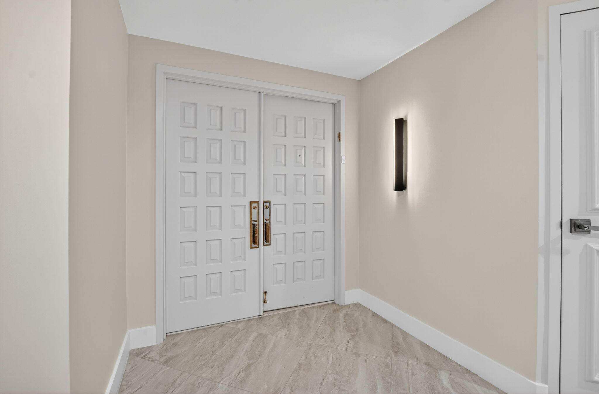 20310 Fairway Oaks Drive, Unit 124 Boca Raton, FL 33434 - Photo 7 of 65 wooden floor in an empty room