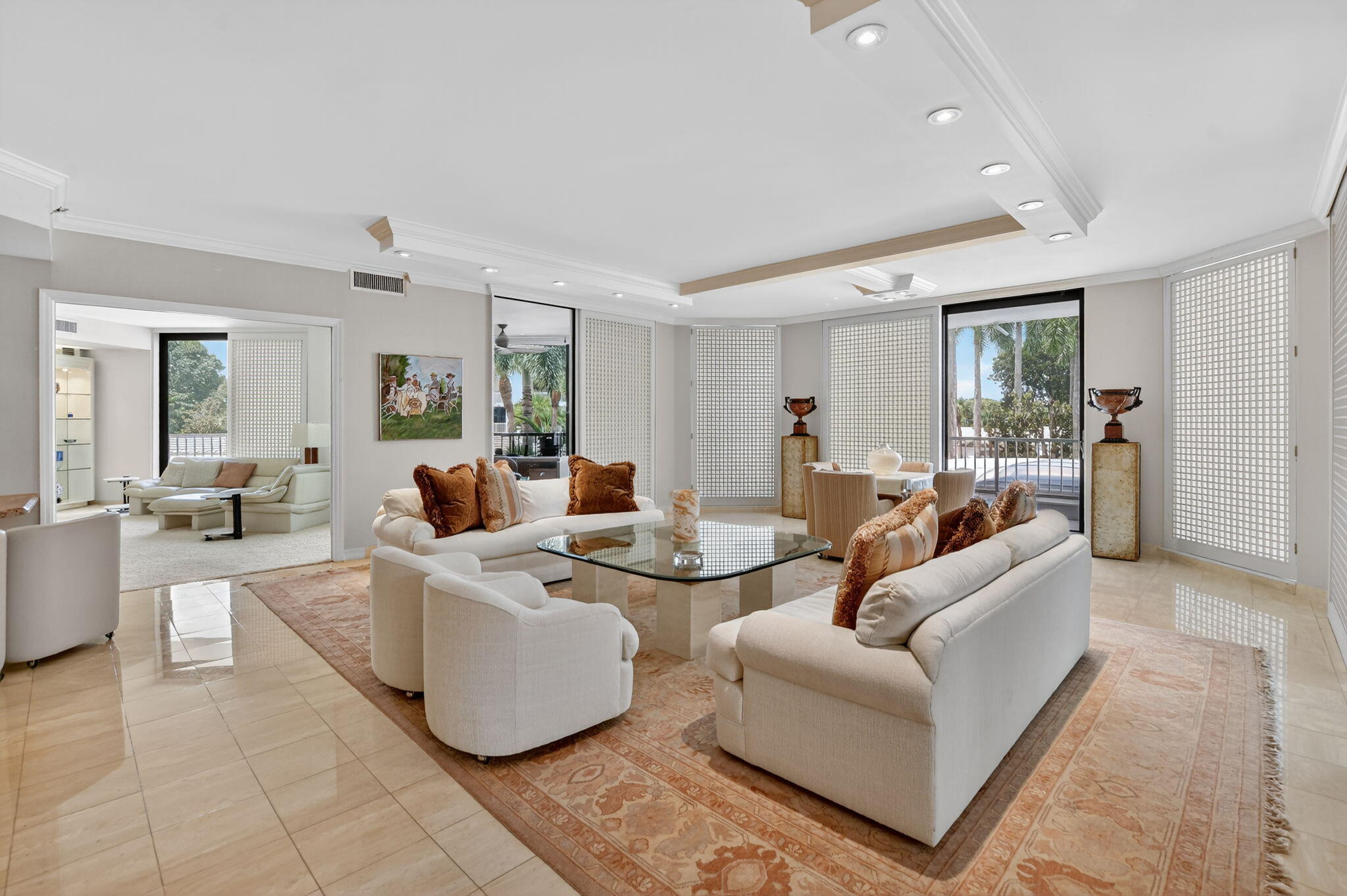 20310 Fairway Oaks Drive, Unit 124 Boca Raton, FL 33434 - Photo 10 of 65 a living room with furniture and a large window