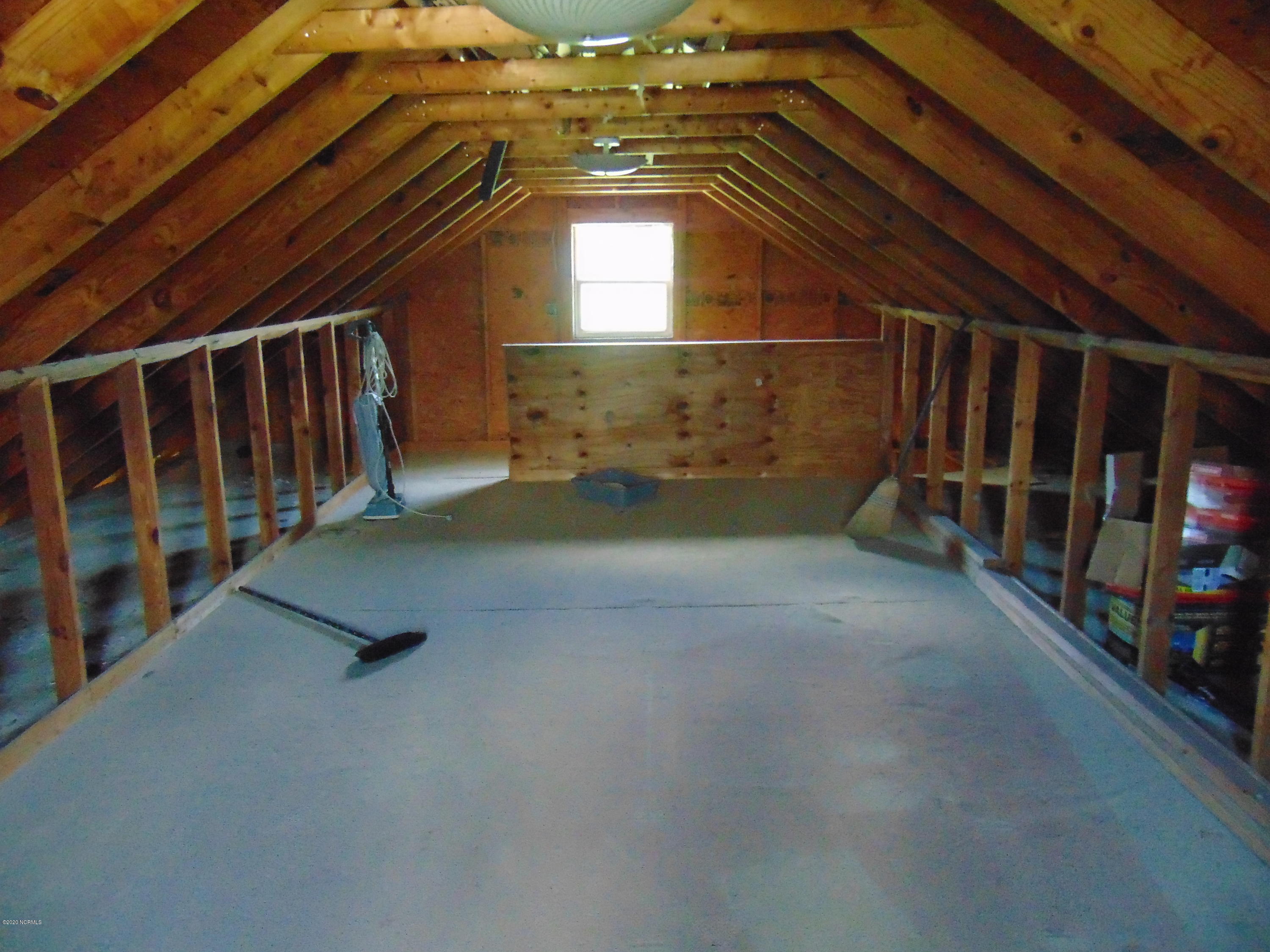 145 Newport Loop Road Newport, NC 28570 - Photo 28 of 29 Upstairs garage storage