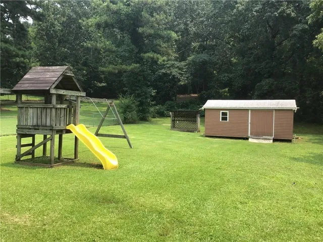 a view of a house with a swimming pool