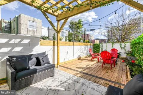 a view of a chairs and tables in the patio