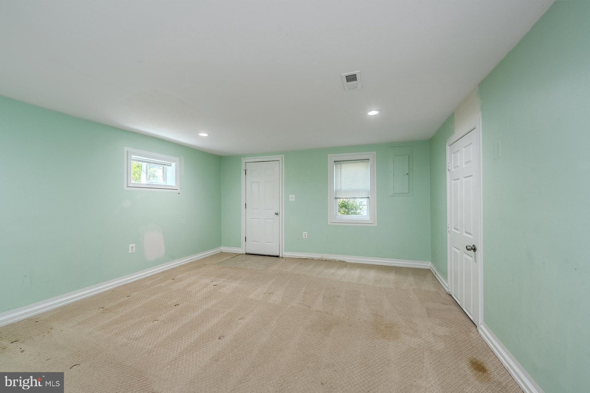 7625 Huron Drive Gainesville, VA 20155 - Photo 22 of 34 a view of an empty room with a window