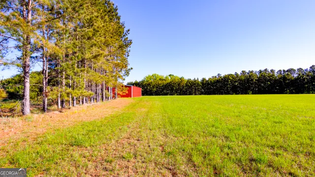 a view of a backyard of a house