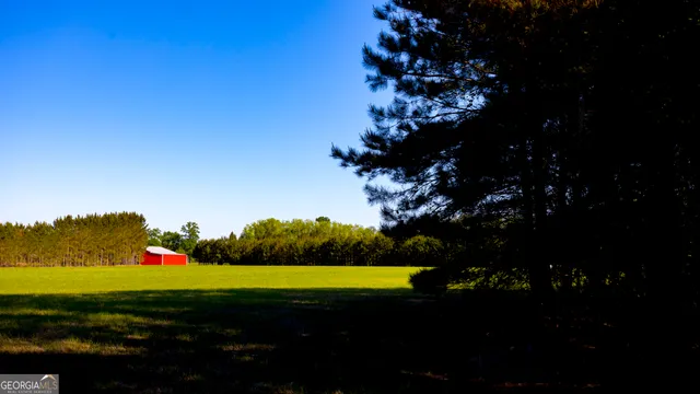 a view of swimming pool from a lake
