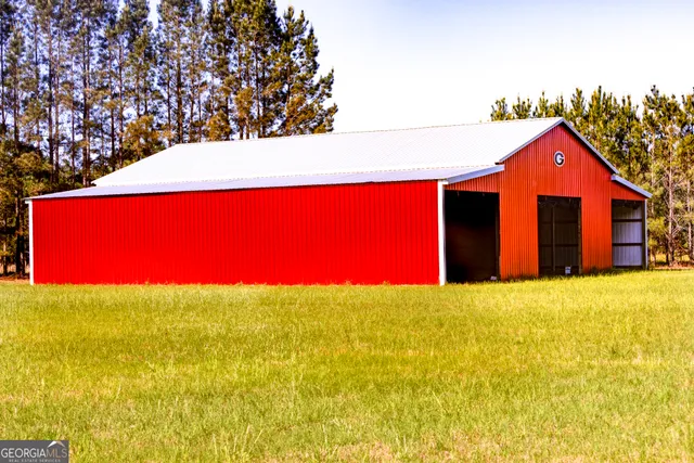 a view of a lake with a yard