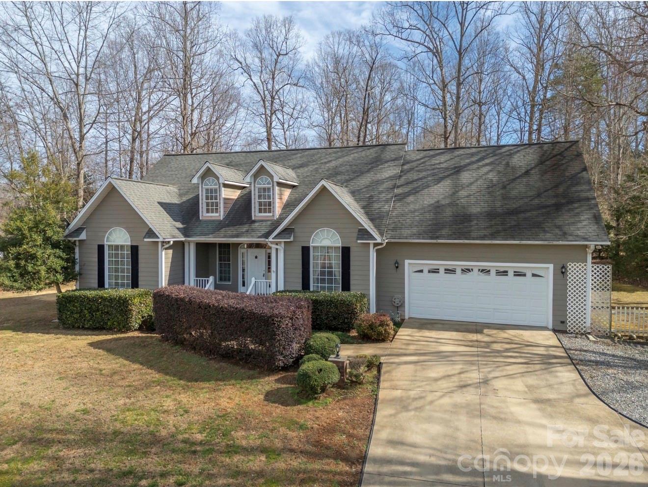 523 Shepherds Creek Circle Rutherfordton, NC 28139 - Photo 1 of 31 a front view of a house with a yard and garage