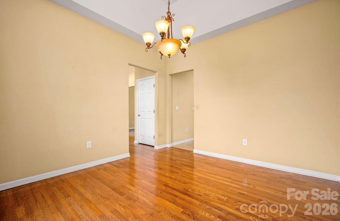 523 Shepherds Creek Circle Rutherfordton, NC 28139 - Photo 13 of 31 a view of an empty room with wooden floor