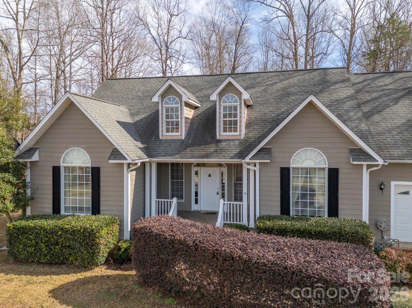 523 Shepherds Creek Circle Rutherfordton, NC 28139 - Photo 2 of 31 a front view of a house with garden