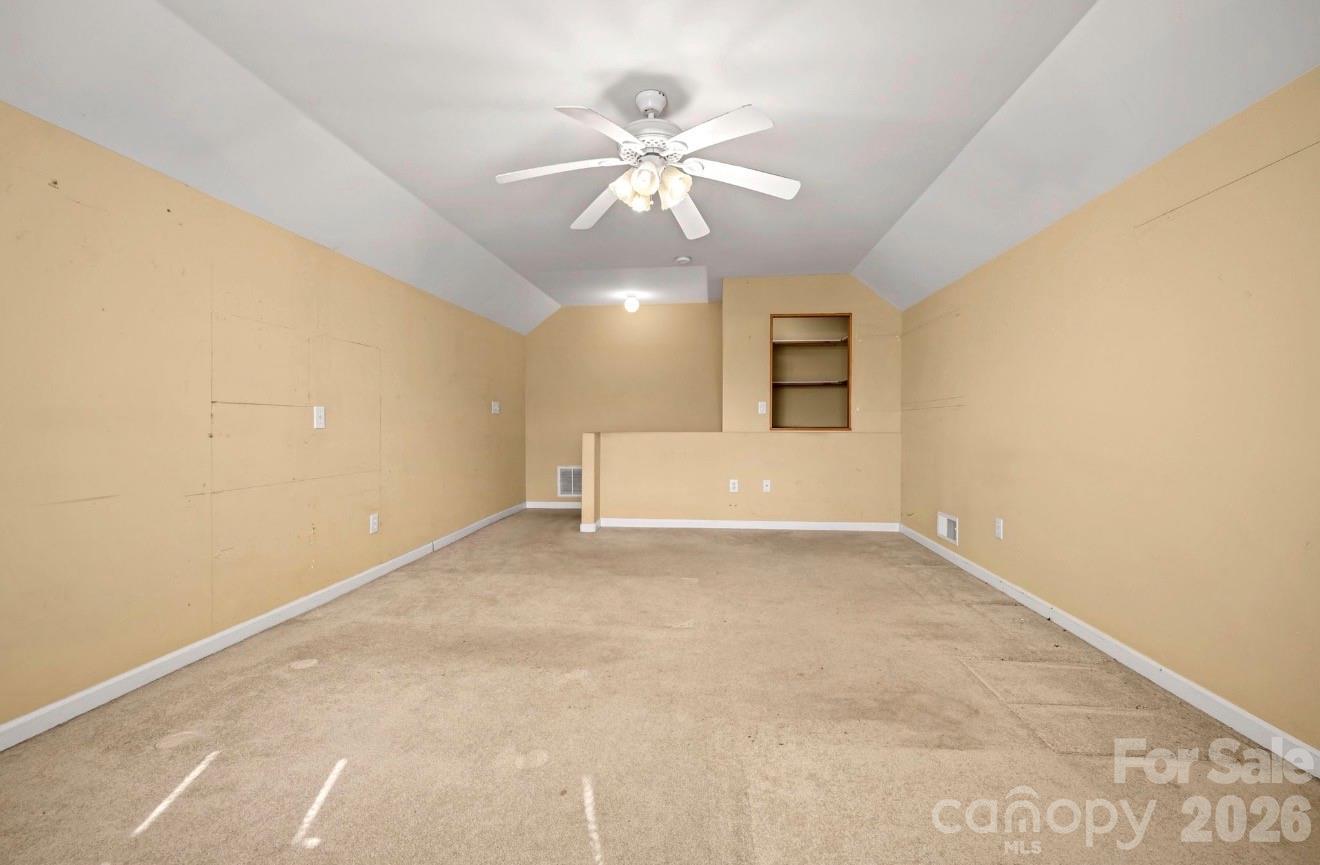 523 Shepherds Creek Circle Rutherfordton, NC 28139 - Photo 26 of 31 an empty room with a ceiling fan and window