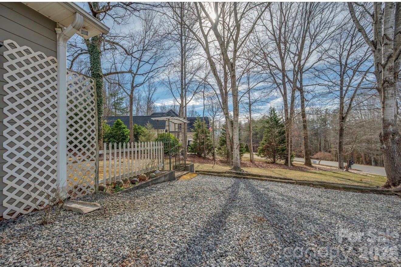 523 Shepherds Creek Circle Rutherfordton, NC 28139 - Photo 4 of 31 a backyard of a house with lots of green space