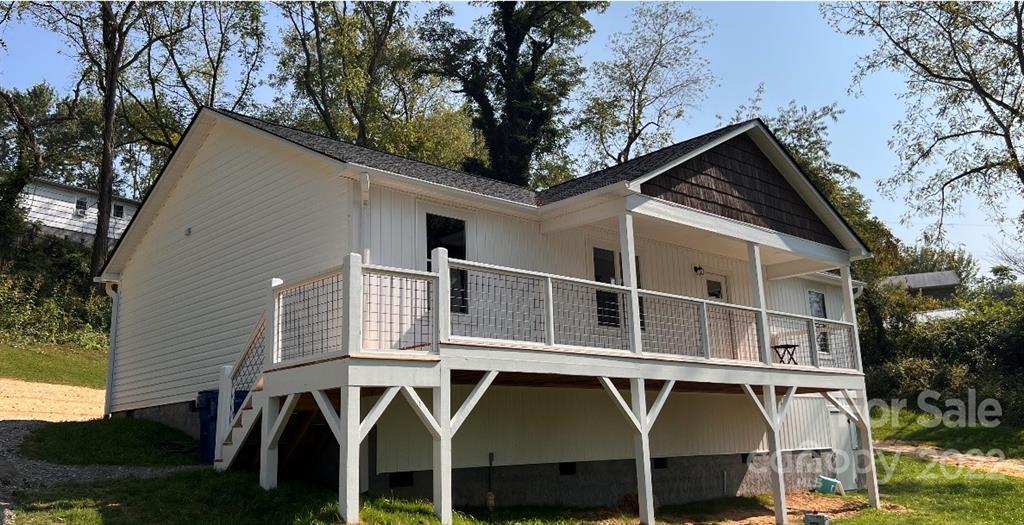 53 Sharptown Road Canton, NC 28716 - Photo 1 of 34 a front view of a house with balcony