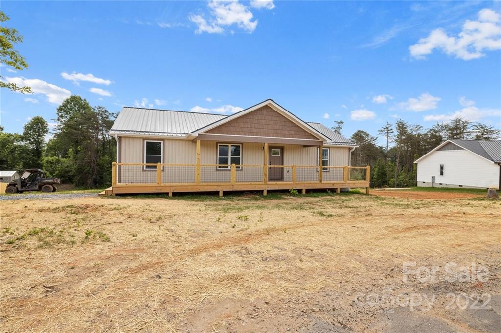 53 Sharptown Road Canton, NC 28716 - Photo 2 of 34 a view of a house with a yard