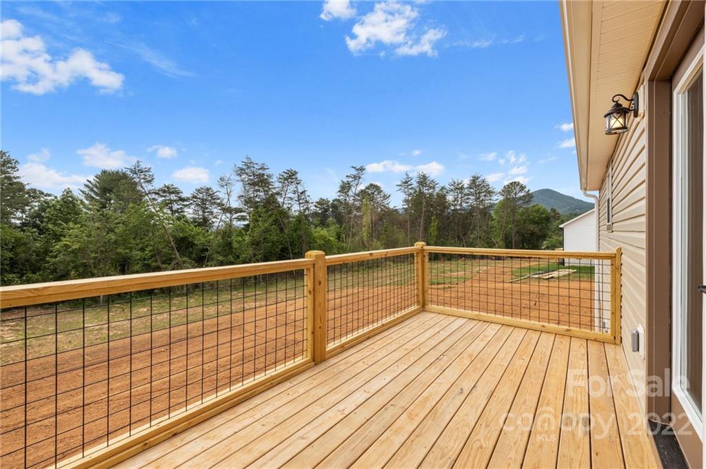 53 Sharptown Road Canton, NC 28716 - Photo 31 of 34 a view of balcony with wooden floor and fence