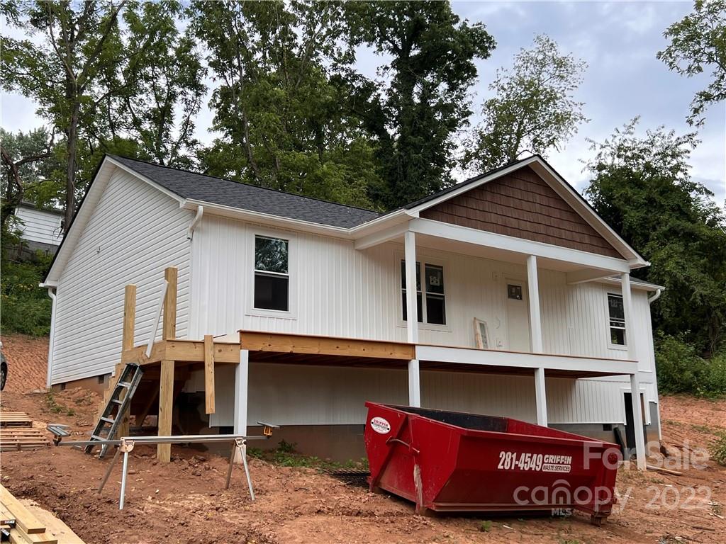 53 Sharptown Road Canton, NC 28716 - Photo 34 of 34 a view of a house with a yard balcony and seating area