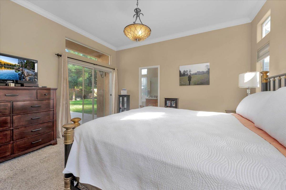 2474 Twain Avenue Clovis, CA 93611 - Photo 25 of 55 a bedroom with a bed and furniture