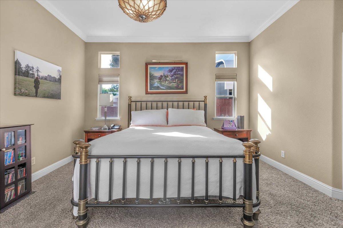 2474 Twain Avenue Clovis, CA 93611 - Photo 26 of 55 a bedroom with a bed and a window