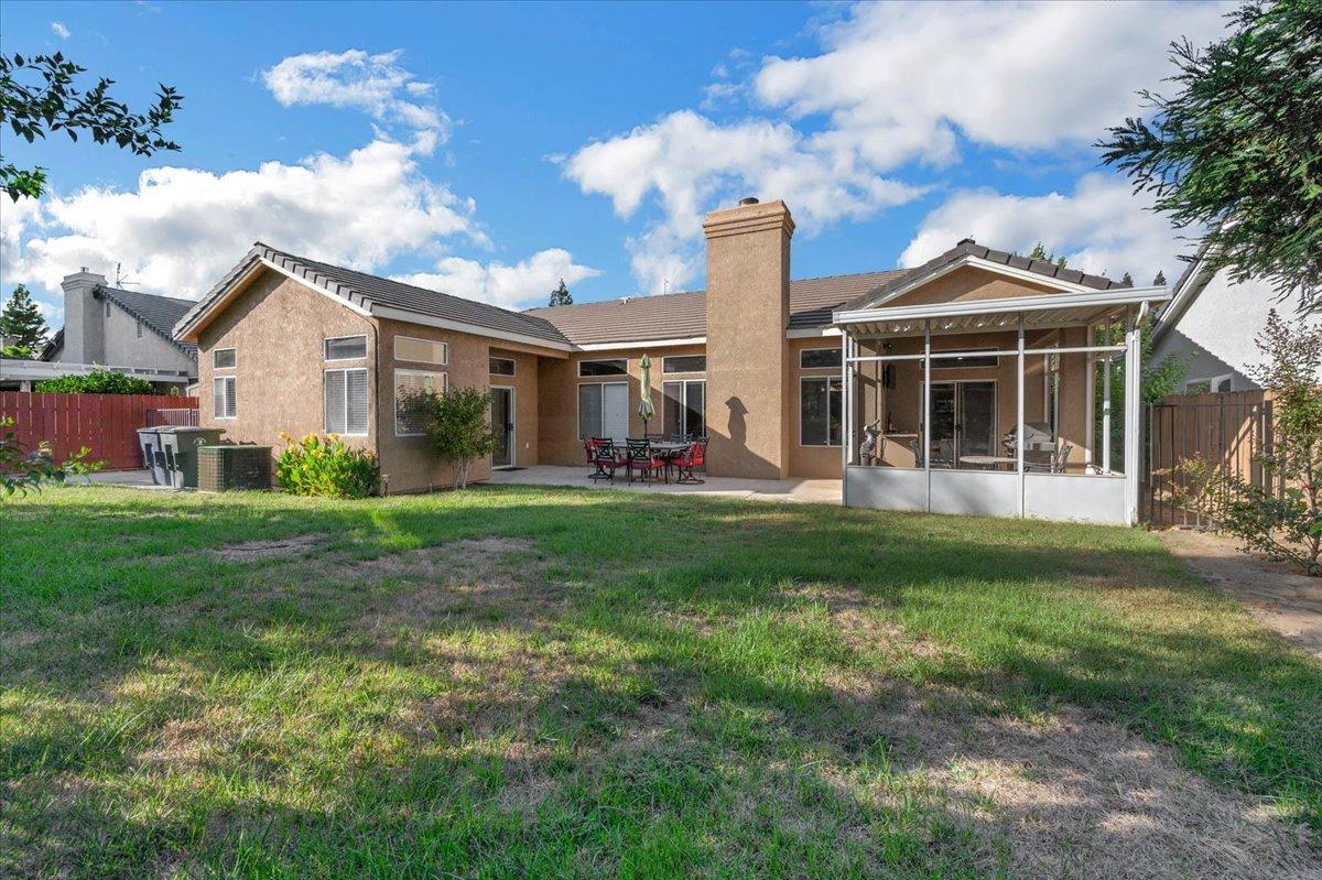 2474 Twain Avenue Clovis, CA 93611 - Photo 37 of 55 a front view of a house with garden
