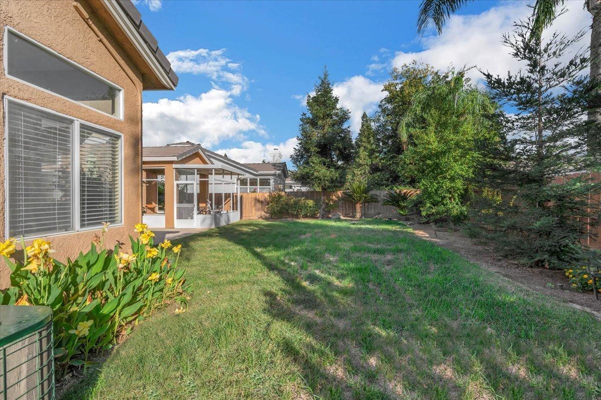 2474 Twain Avenue Clovis, CA 93611 - Photo 42 of 55 a view of a house with a yard