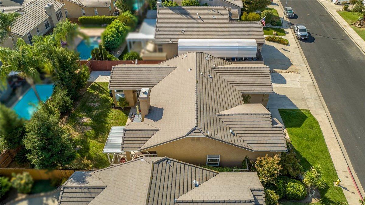 2474 Twain Avenue Clovis, CA 93611 - Photo 44 of 55 a view of a patio with a chairs