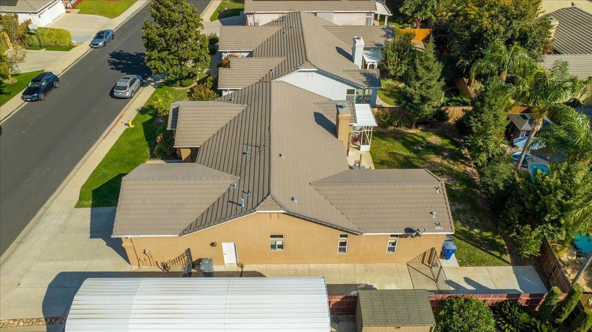 2474 Twain Avenue Clovis, CA 93611 - Photo 45 of 55 an aerial view of a house with a yard and balcony