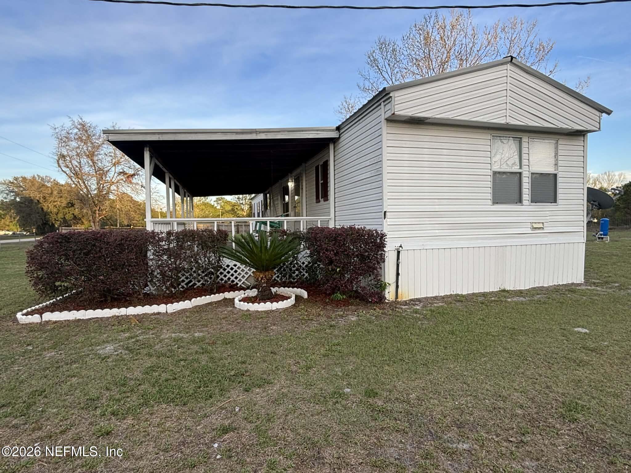 7624 Southwest County Road 225 Starke, FL 32091 - Photo 2 of 56 a view of outdoor space and yard