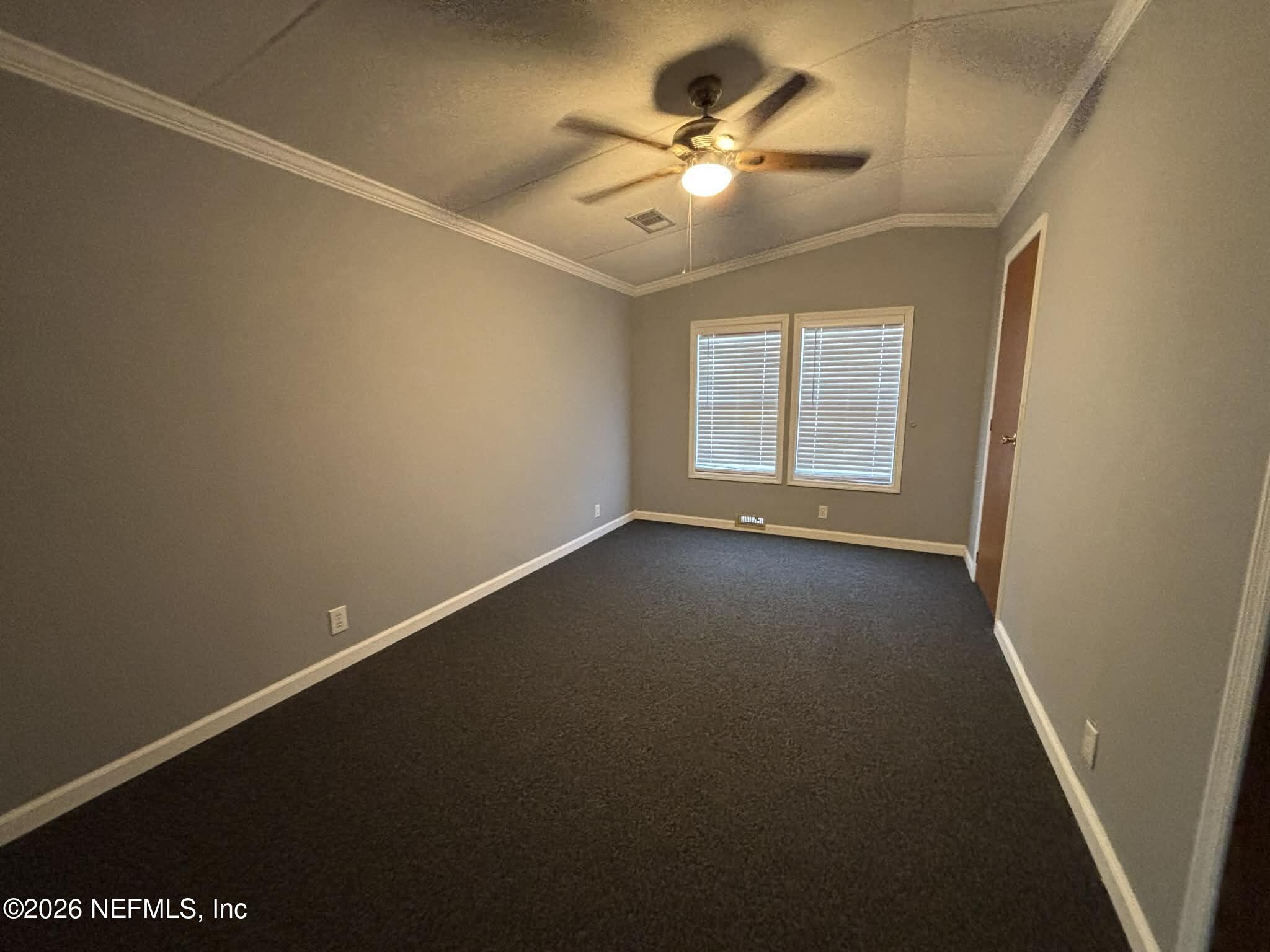7624 Southwest County Road 225 Starke, FL 32091 - Photo 31 of 56 an empty room with a window