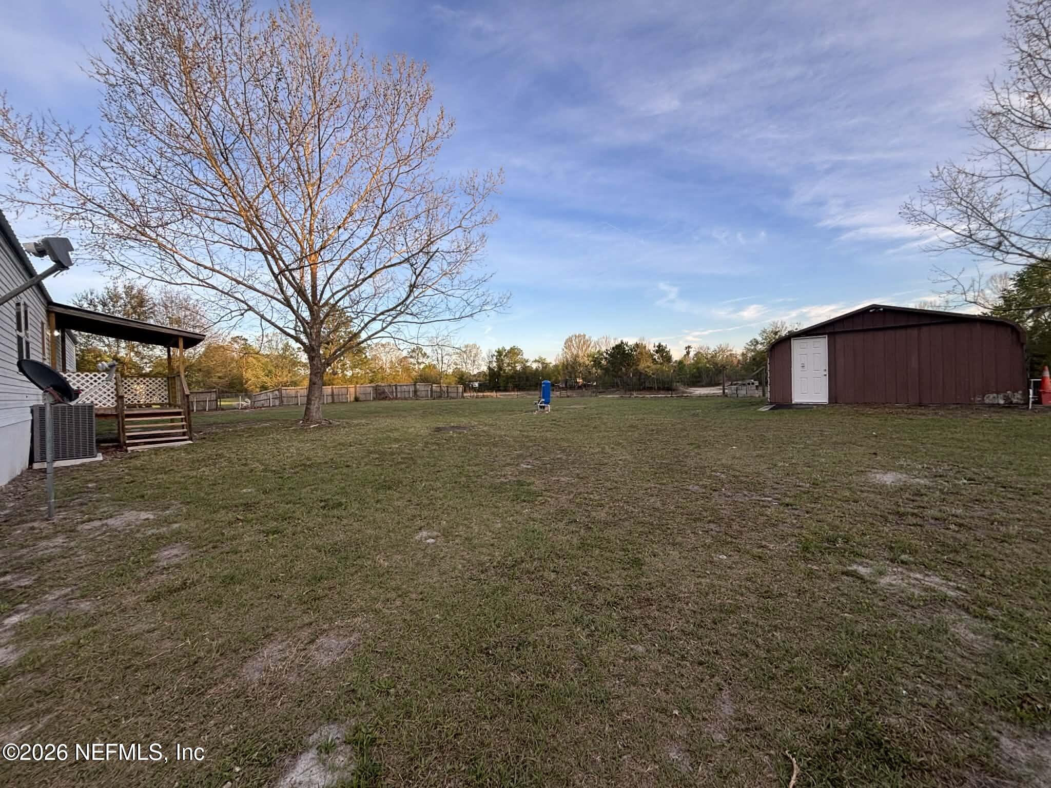 7624 Southwest County Road 225 Starke, FL 32091 - Photo 44 of 56 a view of a house with a yard