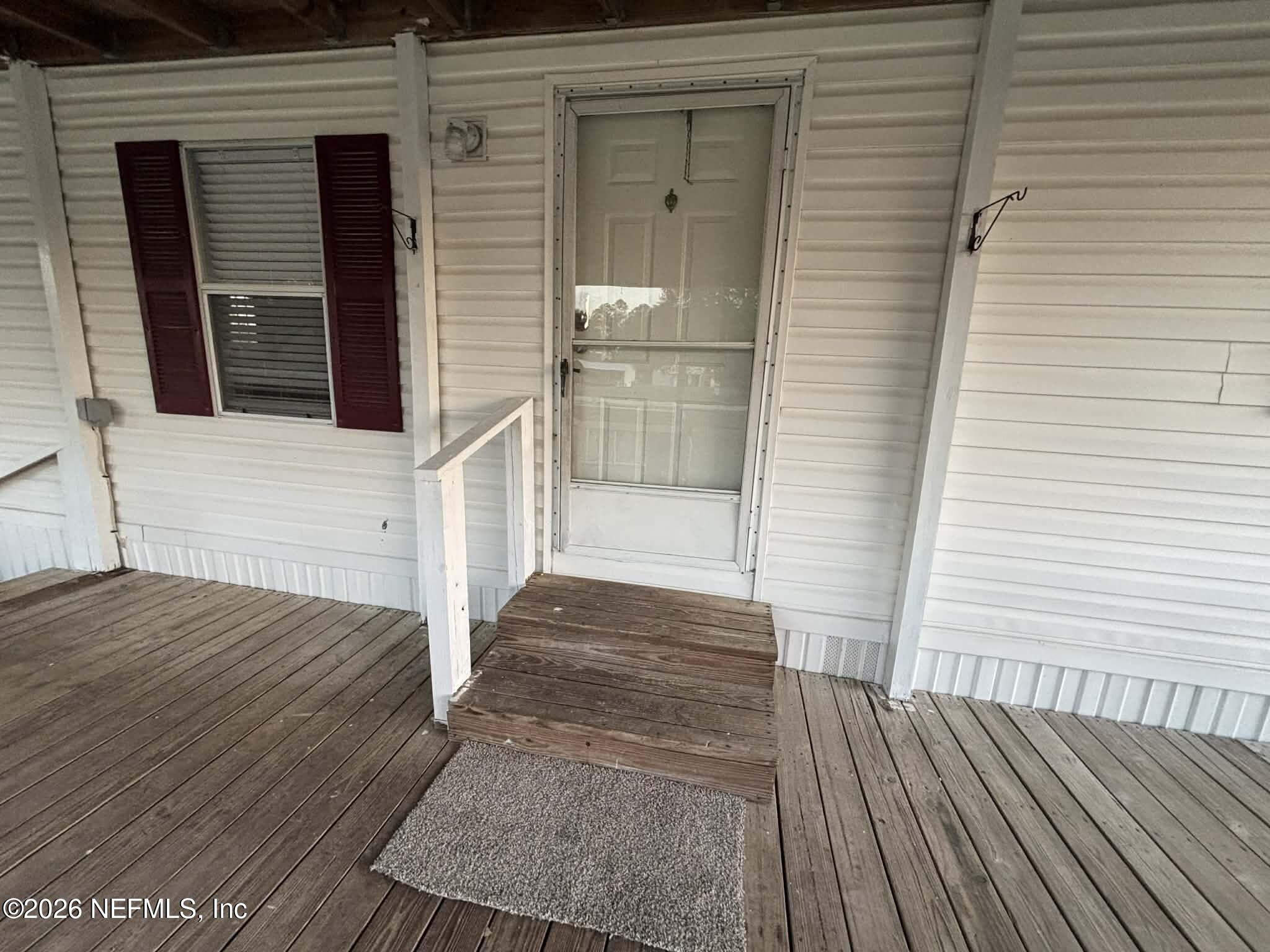 7624 Southwest County Road 225 Starke, FL 32091 - Photo 9 of 56 a view of front door of house