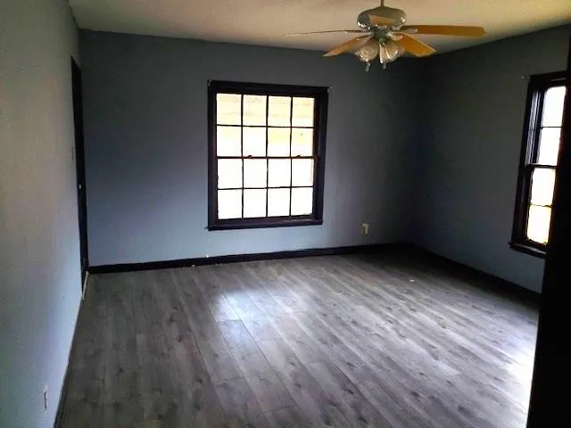 an empty room with windows