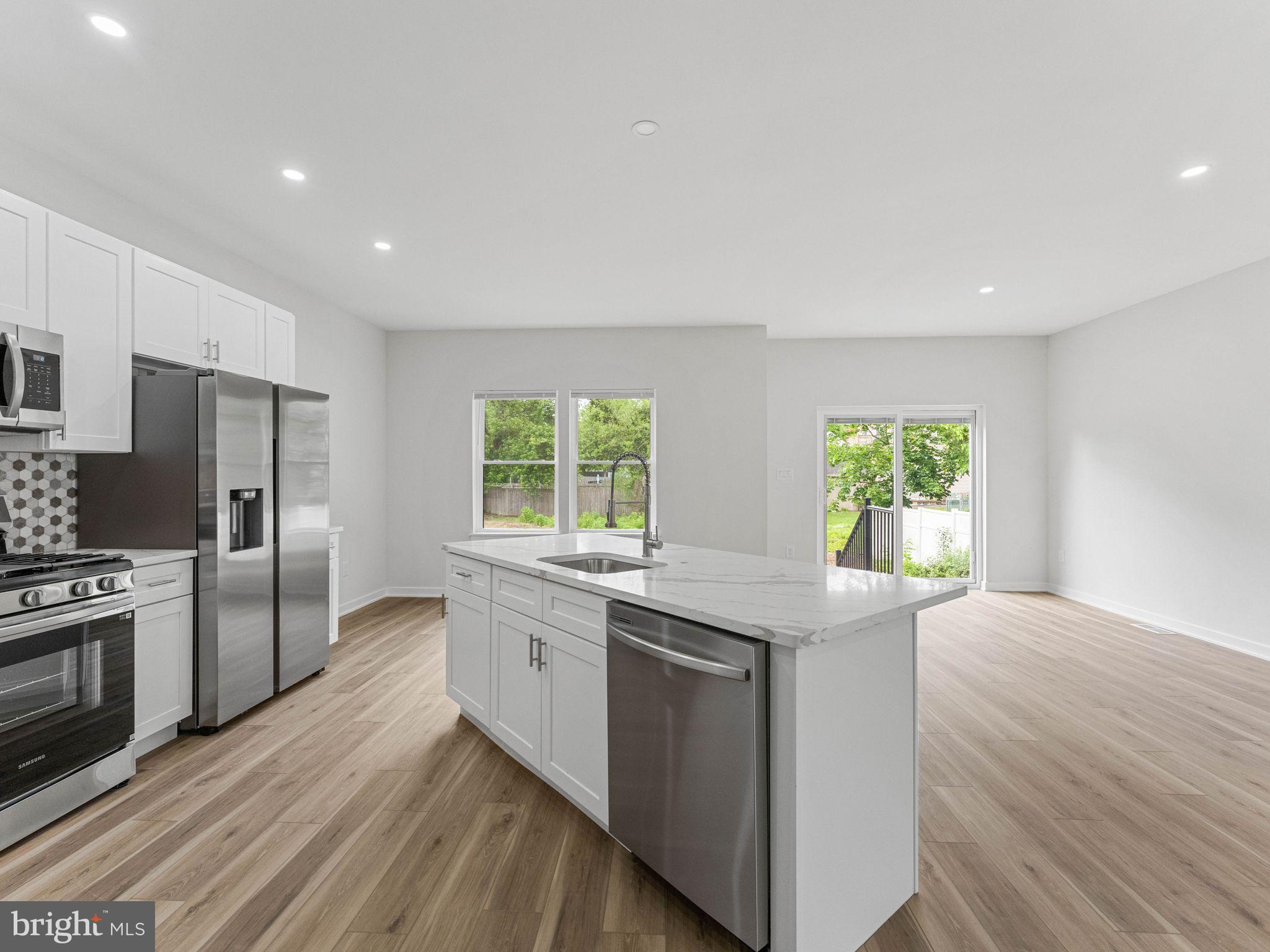 423 Almonesson Road Blackwood, NJ 08012 - Photo 15 of 40 Bright and airy modern kitchen space.