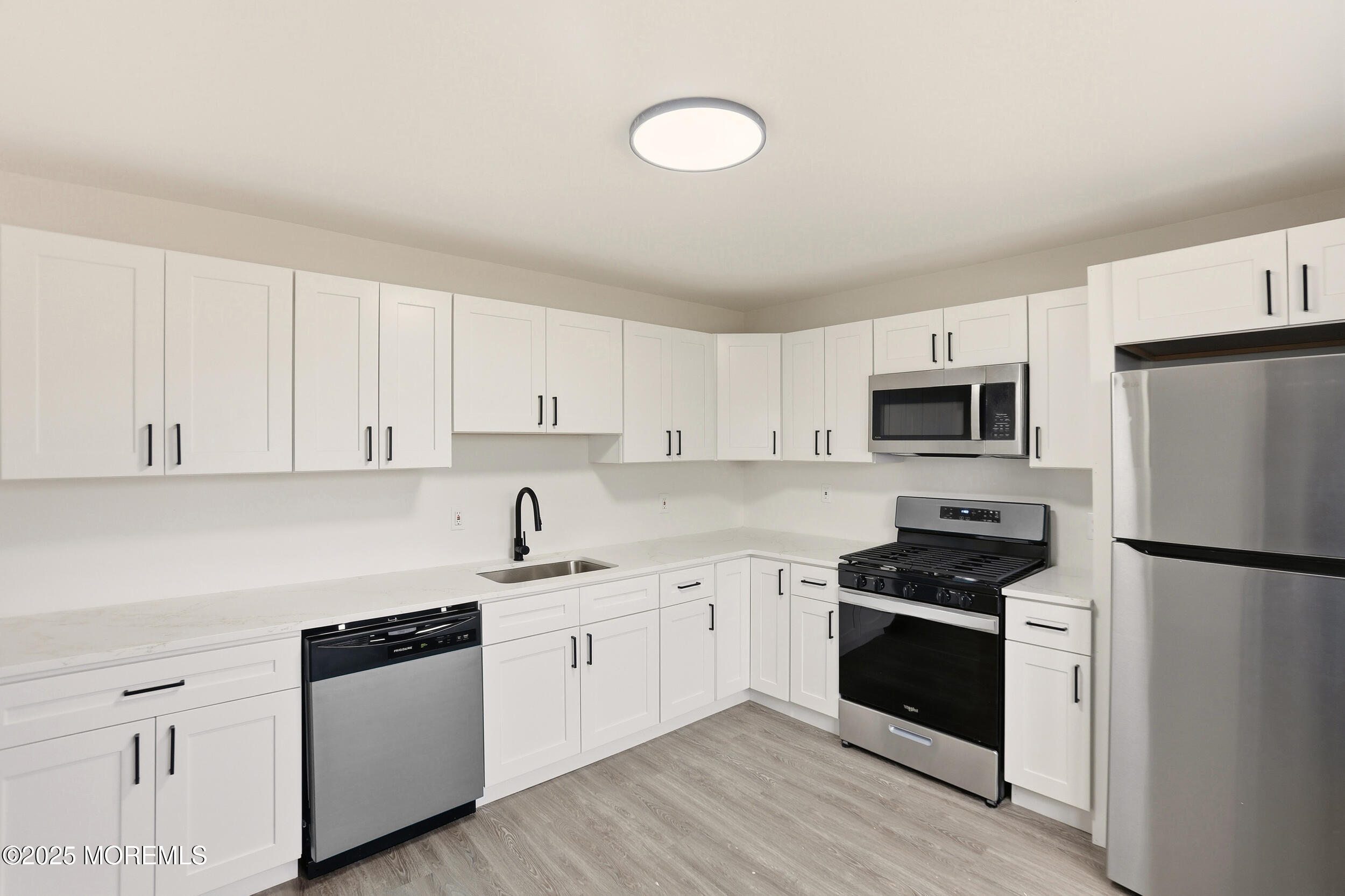 28 Brandies Road Toms River, NJ 08757 - Photo 13 of 30 a kitchen with cabinets stainless steel appliances and sink
