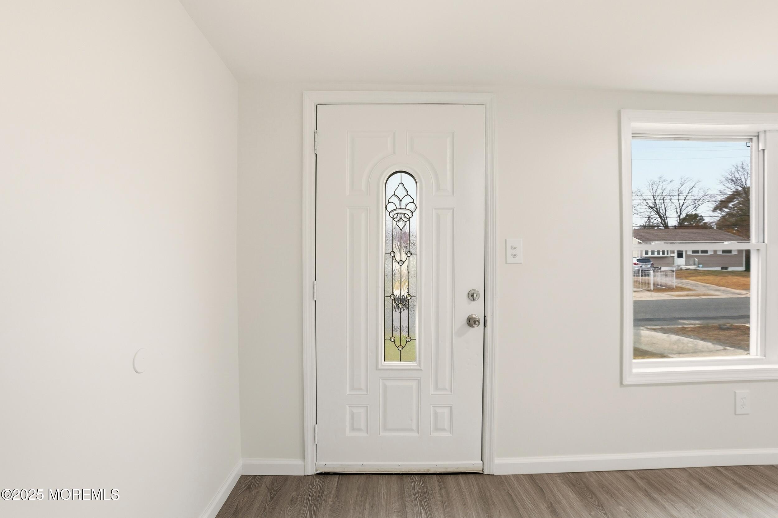 28 Brandies Road Toms River, NJ 08757 - Photo 5 of 30 a view of an entryway with wooden floor