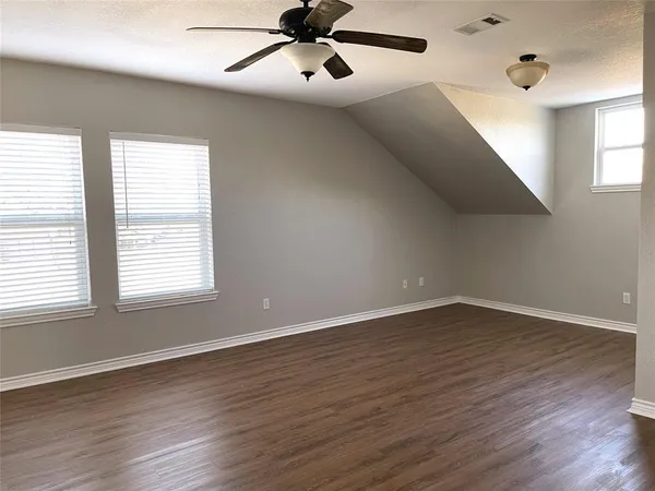 a view of staircase with lots of wooden floor